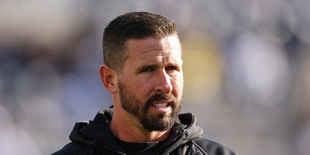 Passing game coordinator Brian Hartline of the Ohio State Buckeyes looks on before the game against the Penn State Nittany Lions at Beaver Stadium on October 29, 2022 in State College, Pennsylvania.