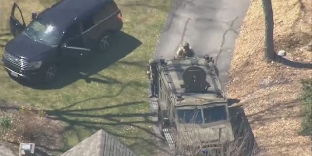 Aerial photo of the arrest of Air National Guardsman Jack Teixeira by FBI agents for allegedly leaking classified materials.