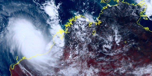 This satellite image provided by Himawari-8, Japan's weather satellite, and the National Institute of Information and Communications Technology shows Cyclone Ilsa approaching the west coast of Australia, Thursday, April 13, 2023.  A severe tropical cyclone has lashed the northwest coast of Australia with officials warning the public to brace for devastating gusts of up to 171 miles per hour, strengthening winds and increasing rain. 