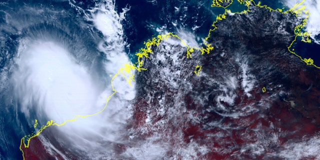 This satellite image taken by Himawari-8, a Japanese weather satellite, and provided by National Institute of Information and Communications Technology, shows cyclone Ilsa approaching Australia's west coast, Thursday, April 13, 2023. A severe tropical cyclone lashed the northwest Australian coast with strengthening winds and increasing rain Thursday as authorities warned the population to prepare for destructive gusts of up to 171 miles per hour. 