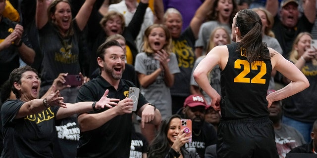 Iowa's Caitlin Clark reacts after an NCAA Women's Final Four semifinals basketball game against South Carolina Friday, March 31, 2023, in Dallas.