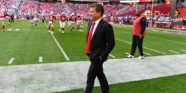 Owner Michael Bidwill of the Arizona Cardinals walks along the sidelines prior to a game against the Los Angeles Chargers at State Farm Stadium Nov. 27, 2022, in Glendale, Ariz.