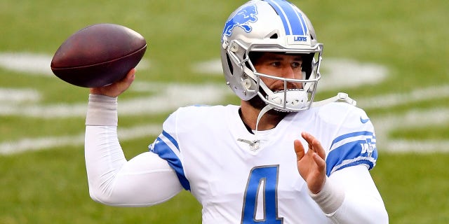 Chase Daniel warms up before a Lions game