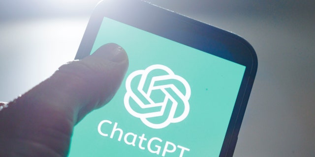 The logo of the chatbot ChatGPT from the company OpenAI can be seen on a smartphone on April 3, 2023, in Berlin, Germany. 