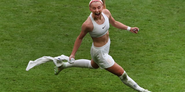 In the year England's Chloe Kelly celebrates after scoring her team's second goal during the UEFA Women's Euro 2022 Final match between England and Germany at Wembley Stadium on July 31, 2022 in London.