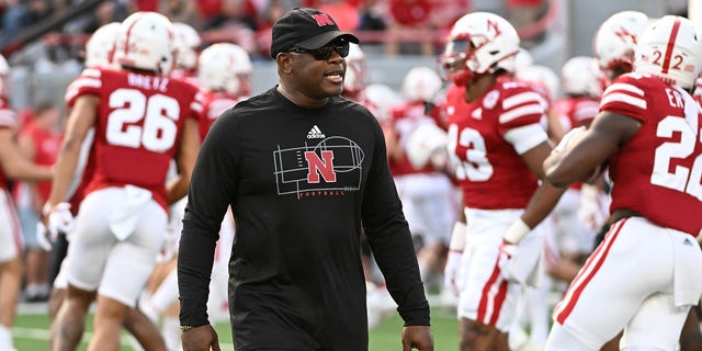 Nebraska Cornhuskers interim head coach Mickey Joseph watches the team warm up before the game against the Indiana Hoosiers at Memorial Stadium on Oct. 1, 2022 in Lincoln, Nebraska.