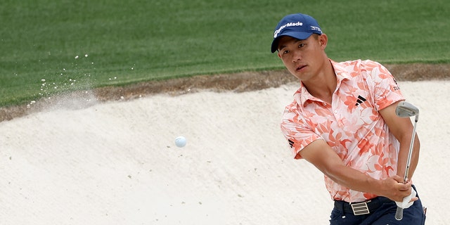 Collin Morikawa of the United States plays a shot from a bunker on the 15th hole during the first round of the 2023 Masters Tournament at Augusta National Golf Club on April 6, 2023 in Augusta, Georgia.