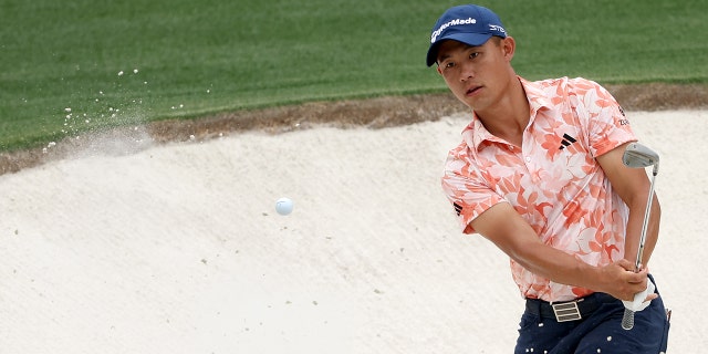 Collin Morikawa of the United States plays a shot from a bunker on the 15th hole during the first round of the 2023 Masters Tournament at Augusta National Golf Club on April 06, 2023 in Augusta, Georgia.