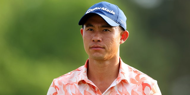 Collin Morikawa of the United States watches the 18th hole during the first round of the 2023 Masters Tournament at Augusta National Golf Club on April 6, 2023 in Augusta, Georgia.