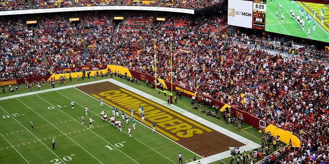 Fans watch as the Washington Commanders face the Jacksonville Jaguars on Sept. 11, 2022, in Landover, Maryland.