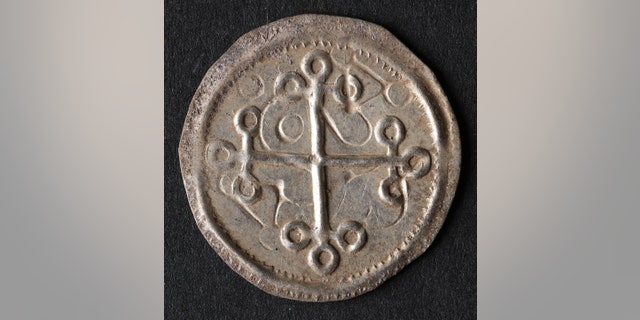 A cross coin