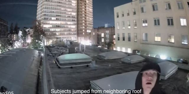 A potential intruder is deterred by a Deep Sentinel security system.