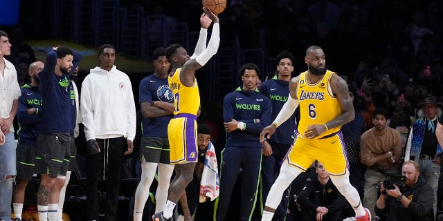 Lakers guard Dennis Schroder makes a 3-point basket in the closing seconds of the fourth quarter against the Minnesota Timberwolves on Tuesday, April 11, 2023, in Los Angeles.
