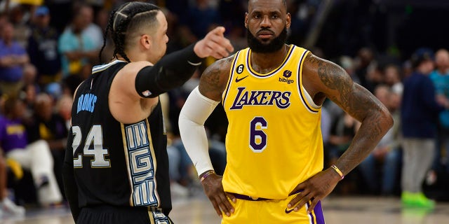 Dillon Brooks points to LeBron James