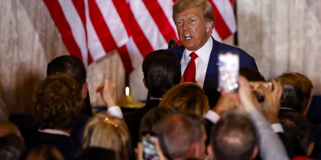 Former US President Donald Trump departs after delivering remarks at the Mar-a-Lago Club