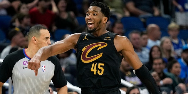 Donovan Mitchell of the Cleveland Cavaliers celebrates after hitting a 3-pointer against the Magic, Tuesday, April 4, 2023, in Orlando, Florida.