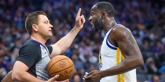 Golden State Warriors forward Draymond Green, right, argues with referee Gediminas Petraitis in the first half during Game 2 in the first round of the NBA basketball playoffs against the Sacramento Kings in Sacramento, Calif., Monday, April 17, 2023. 