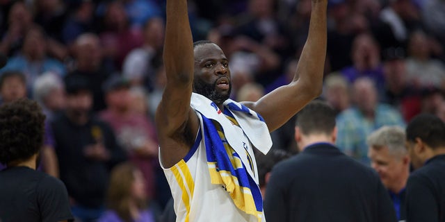 Golden State Warriors forward Draymond Green reacts after he was ejected from Game 2 in the first round of the NBA basketball playoffs for stomping on the chest of Sacramento's Domantas Sabonis, Monday, April 17, 2023, in Sacramento, Calif.