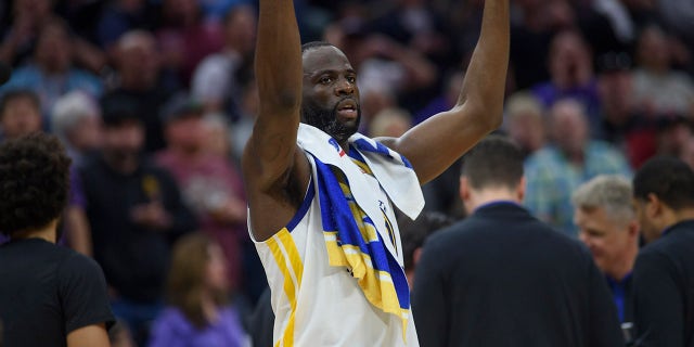Golden State Warriors forward Draymond Green reacts after he was ejected from Game 2 in the first round of the NBA basketball playoffs for stomping on the chest of Sacramento's Domantas Sabonis, Monday, April 17, 2023, in Sacramento, Calif.