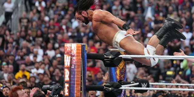 Drew McIntyre flips onto Sheamus during WrestleMania at SoFi Stadium, April 2, 2023, in Inglewood, California.