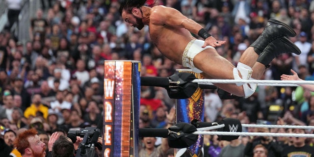 Drew McIntyre flips onto Sheamus during WrestleMania at SoFi Stadium, April 2, 2023, in Inglewood, California.