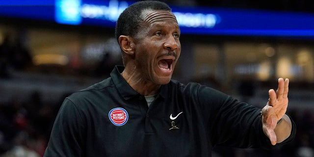 Detroit Pistons head coach Dwane Casey talks to his team during the first half of an NBA basketball game against the Chicago Bulls in Chicago, Sunday, April 9, 2023.