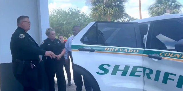 Brevard County Sheriff Wayne Ivey met the team while the suspects were being walked to the car as they were being transported to the jail.