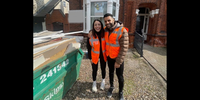 Couple in front of former nursing home