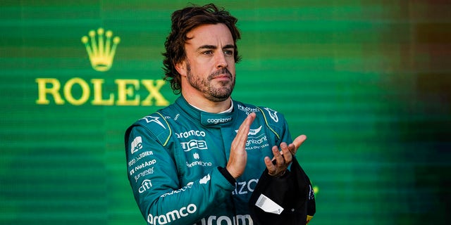 Fernando Alonso applauds