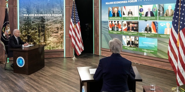 President Joe Biden and Special Presidential Envoy for Climate John Kerry participate in a virtual meetin