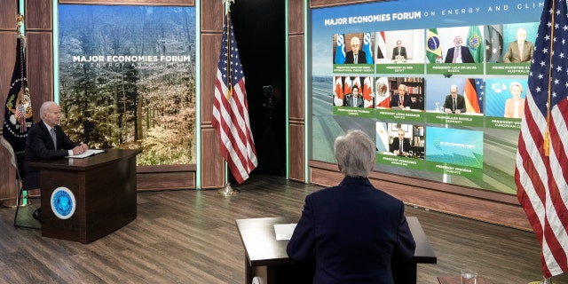 President Joe Biden and Special Presidential Envoy for Climate John Kerry participate in a virtual meetin