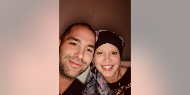 Before getting the vaccine, Davis (pictured with her husband) went through grueling treatments that included chemotherapy, surgeries and 26 rounds of radiation. Of the breast cancer vaccine she received during the trial period, she said, "There were very specific guidelines and a lot of testing I had to go through." Now, she's awaiting the results. 