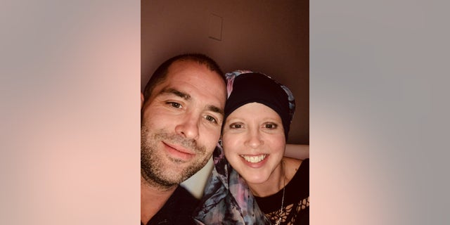 Before getting the vaccine, Davis (pictured with her husband) went through grueling treatments that included chemotherapy, surgeries and 26 rounds of radiation. Of the breast cancer vaccine she received during the trial period, she said, "There were very specific guidelines and a lot of testing I had to go through." Now, she's awaiting the results.