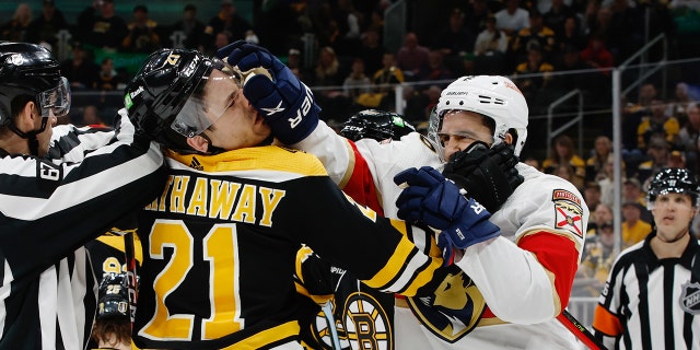 Garnet Hathaway #21 of the Boston Bruins and Colin White #6 of the Florida Panthers shove each other during the second period of Game One of the First Round of the 2023 Stanley Cup Playoffs at the TD Garden on April 17, 2023 in Boston, Massachusetts.
