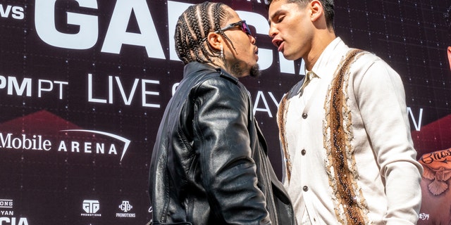 Ryan Garcia, right, and Gervonta Davis face off during a news conference at The Beverly Hilton on March 9, 2023, in Beverly Hills, California.