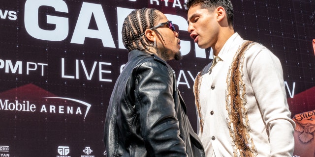 Ryan Garcia, right, and Gervonta Davis face off during a news conference at The Beverly Hilton on March 9, 2023, in Beverly Hills, California.