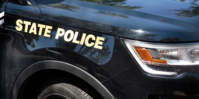A state police car was parked in the street in Santa Fe, New Mexico.