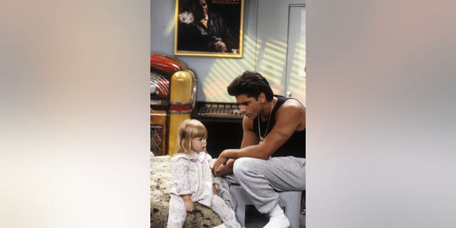 Olsen twin John Stamos on Full House set