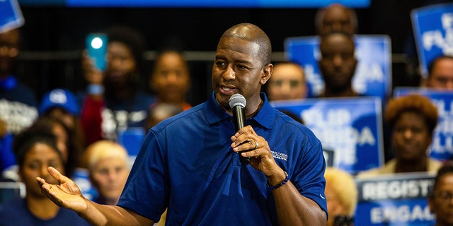 Andrew Gillum with a microphone