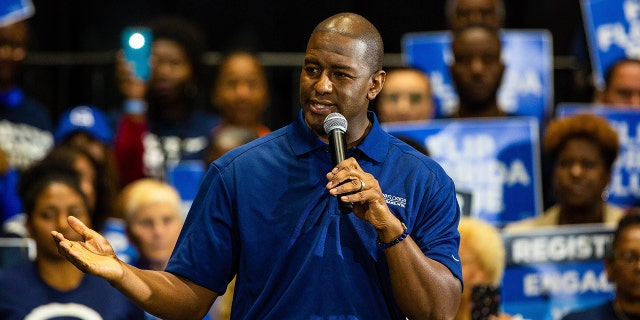 Andrew Gillum with a microphone