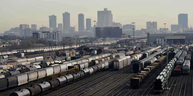 Tankers and freight cars sit at the Union Pacific Corp. train yard in Fort Worth, Texas, on, March 22, 2019. A Union Pacific train collided with an unoccupied train in Chico, Texas, causing it to derail. Two rail workers were injured in the accident. 