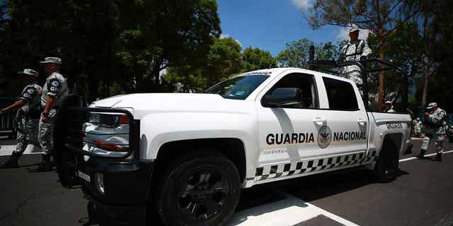 A Mexican National Guard vehicle is shown during a ceremony at Campo Marte on June 30, 2019, in Mexico City, Mexico. A Mexican man says the country's National Guard opened fired on the SUV he was in killing two people and wounding two others. The man's pregnant girlfriend was killed in the shooting.