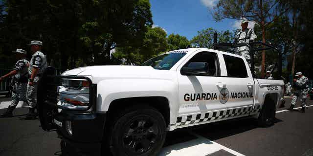 A Mexican National Guard vehicle is shown during a ceremony at Campo Marte on June 30, 2019, in Mexico City, Mexico. A Mexican man says the country's National Guard opened fired on the SUV he was in killing two people and wounding two others. The man's pregnant girlfriend was killed in the shooting.