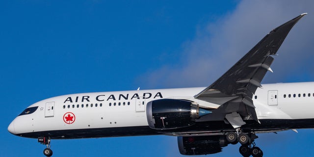 Air Canada Boeing 787-9 Dreamliner aircraft landing at London Heathrow International Airport LHR EGLL during a blue sky summer day in England, UK, on 2 August 2019.