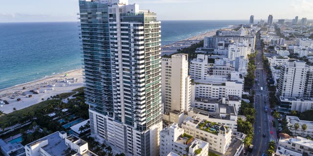 Florida, Miami Beach, aerial of the Setai Miami Beach hotel and Collins Avenue.Â