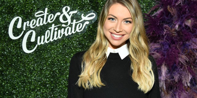 Stassi Schroeder smiling at an event