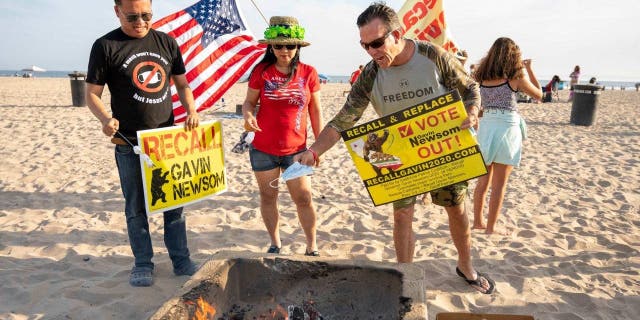 Protesters burn masks