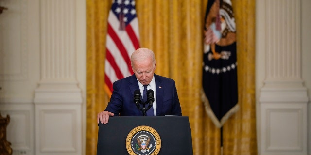 President Biden pauses while he speaks about the situation in Afghanistan in the East Room of the White House on August 26, 2021, in Washington, DC. At least 13 American service members were killed by suicide bomb attacks near the Hamid Karzai International Airport in Kabul, Afghanistan. 