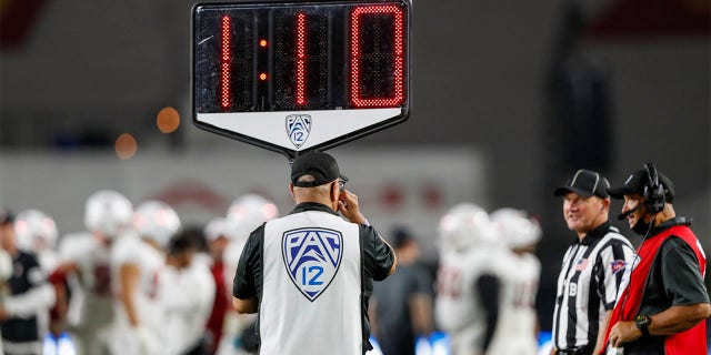 A clock during a college football game