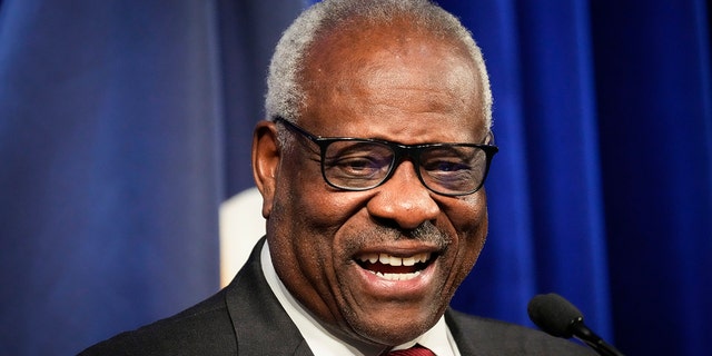 Justice Clarence Thomas smiling 